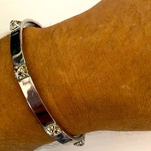 BCBG Max Azria silver tone cuff bracelet.